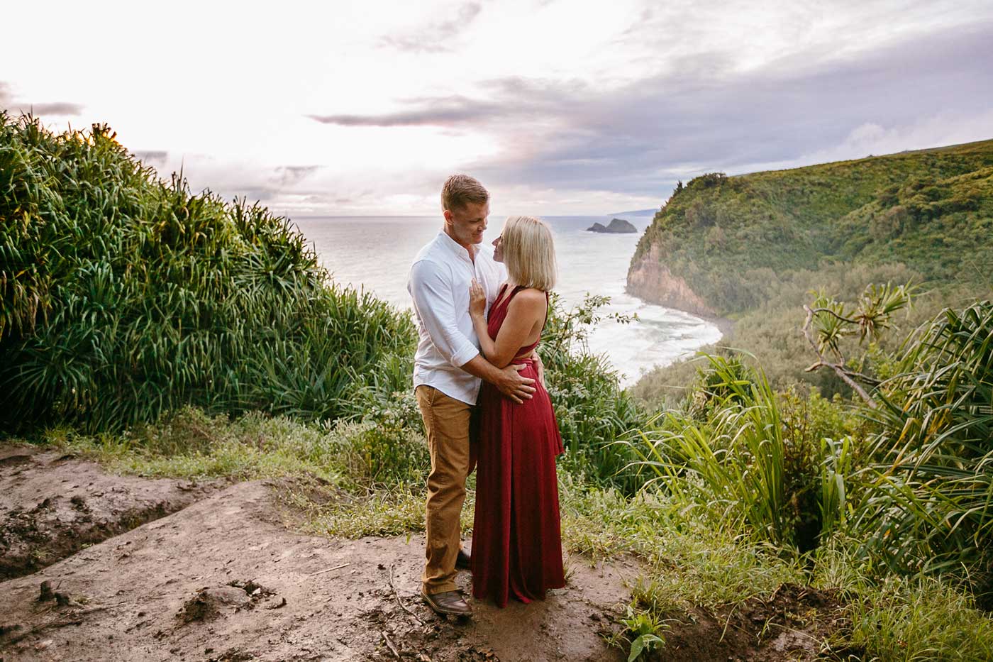 image of couple standing near scenic point