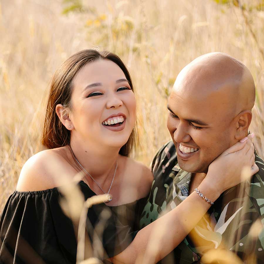 image of couple together in the grass