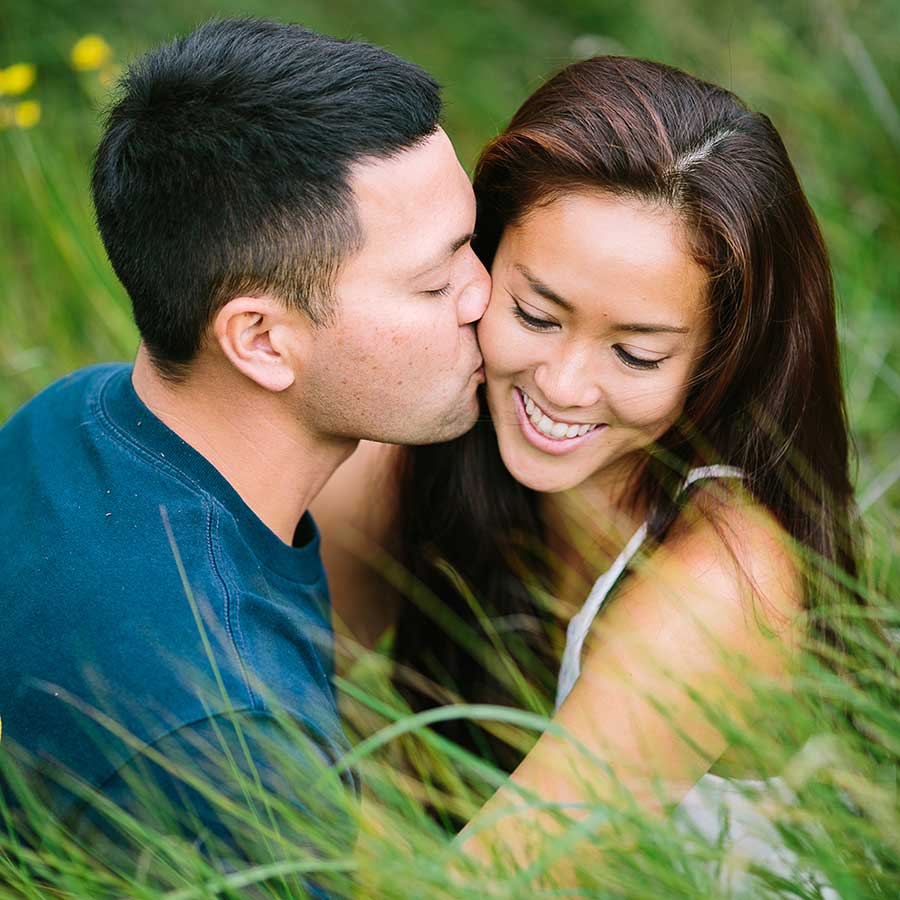 image of couple together in the grass