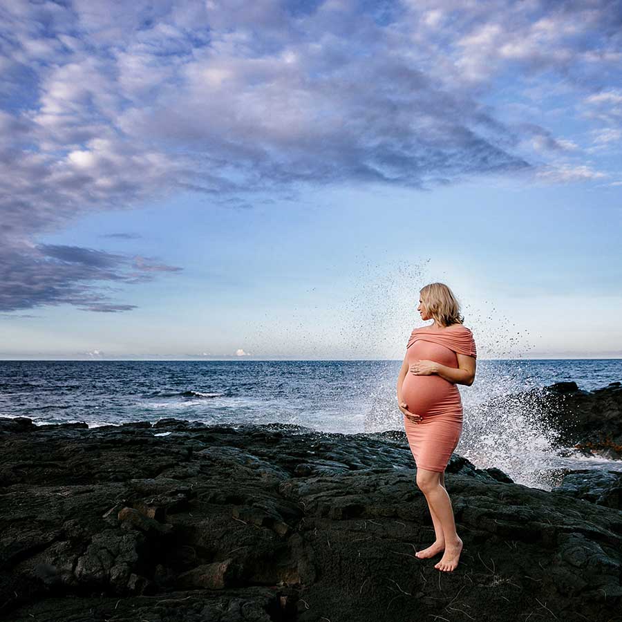 image of pregnant woman near the ocean