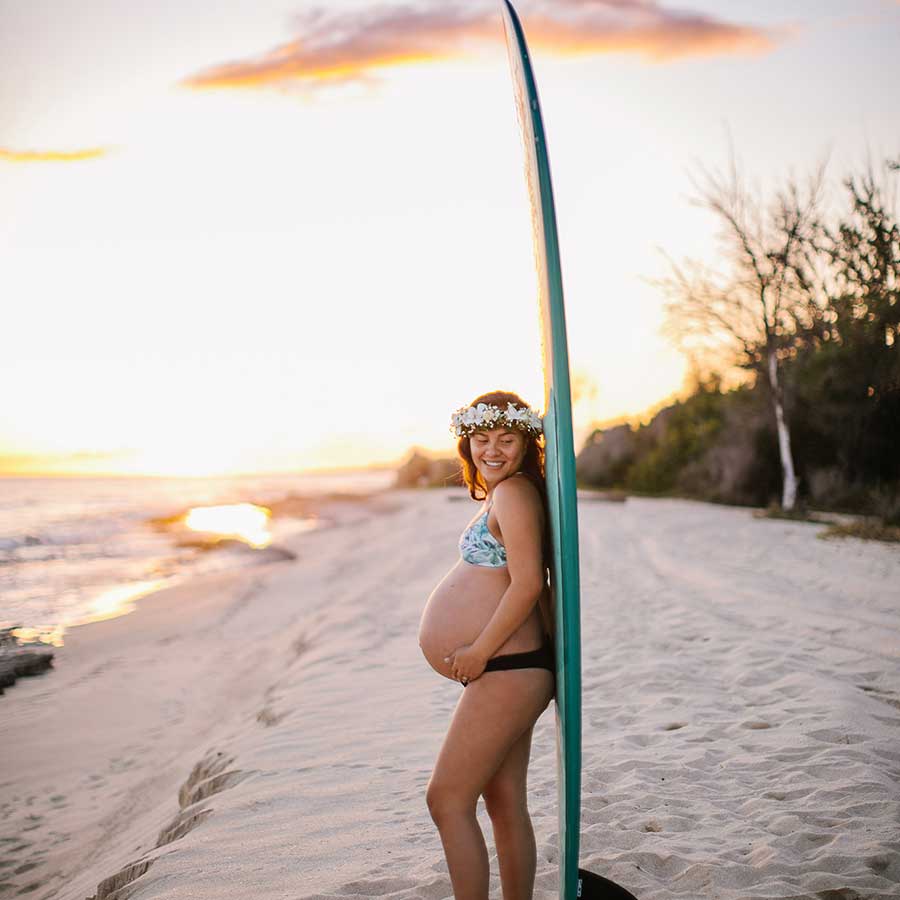image of pregnant woman near the ocean